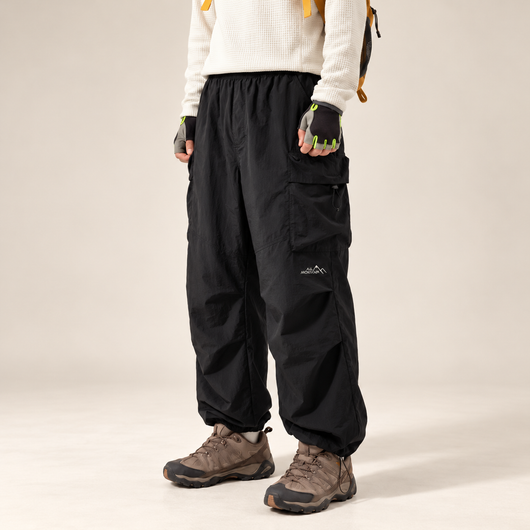 Azuria TrailFlow black lightweight hiking cargo pants — studio view